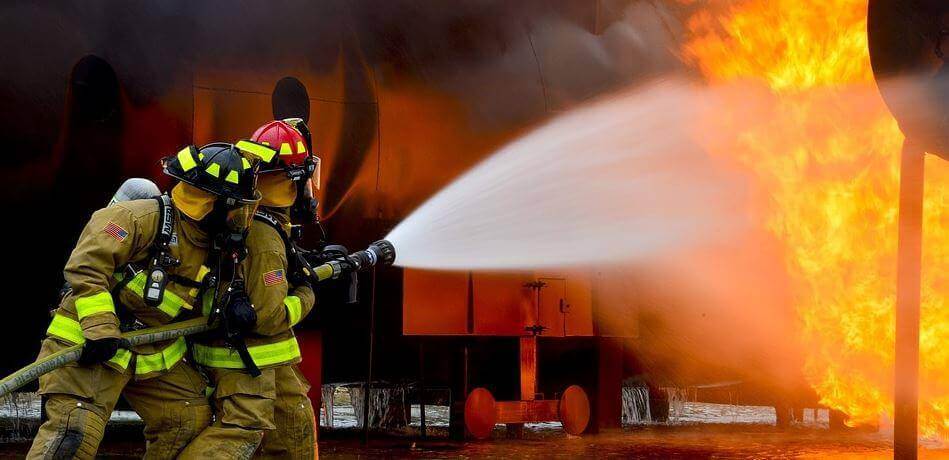 Firemen and fire hose. 