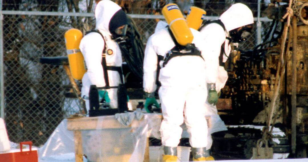 People in hazmat suits